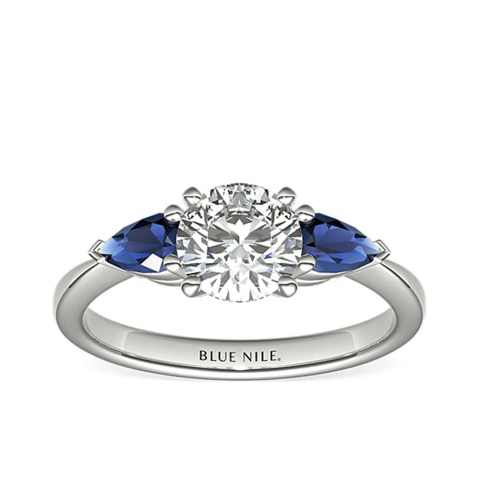 Blue Nile Classic Pear Shaped Sapphire Engagement Ring In Platinum on white background