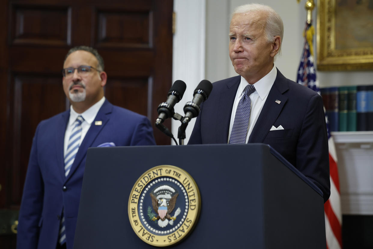 WASHINGTON, DC - JUNE 30: U.S. President Joe Biden is joined by Education Secretary Miguel Cardona as he announces new actions to protect borrowers after the Supreme Court struck down his student loan forgiveness plan in the Roosevelt Room at the White House on June 30, 2023 in Washington, DC. In a 6-to-3 decision, the court ruled the loan forgiveness program -- which was projected to help 40 million people and cost $400 billion -- was unconstitutional.  (Photo by Chip Somodevilla/Getty Images)