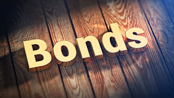 The word bonds in gold letters on wooden planks