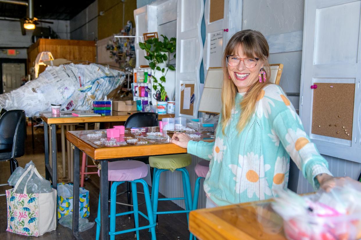 Peoria artist Jessica McGhee spends a lot of time in her new studio on Main Street in a building that once housed a bar she used to own. McGhee recently finished treatment for cancer and has renewed her efforts to make her business more sustainable.