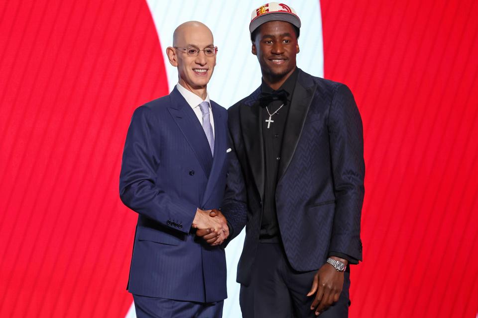 Jun 23, 2022; Brooklyn, NY, USA; A.J. Griffin (Duke) shakes hands with NBA commissioner Adam Silver after being selected as the number sixteen overall pick by the Atlanta Hawks in the first round of the 2022 NBA Draft at Barclays Center. Mandatory Credit: Brad Penner-USA TODAY Sports