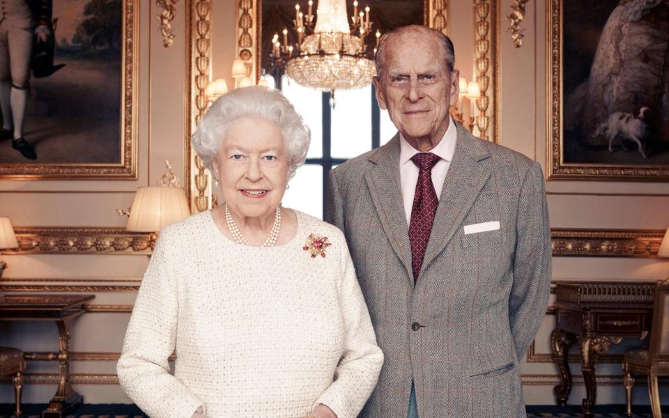 Queen Elizabeth II and Prince Philip, Duke of Edinburgh in the White Drawing Room at Windsor Castle - REUTERS