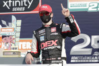 Harrison Burton celebrates after winning a NASCAR Xfinity Series auto race Saturday, June 13, 2020, in Homestead, Fla. (AP Photo/Wilfredo Lee)