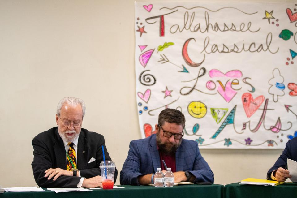 Tallahassee Classical School board chairman Barney Bishop, left, leads a board meeting with board member Matt Mohler sitting to his right, Monday, March 27, 2023. 