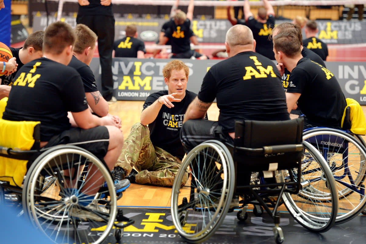 Duke of Sussex 40th birthday: <p>Harry, 29, with the wheelchair basketball teams in Queen Elizabeth Park when he announced his new Invictus Games in 2014 </p> (John Stillwell/PA)