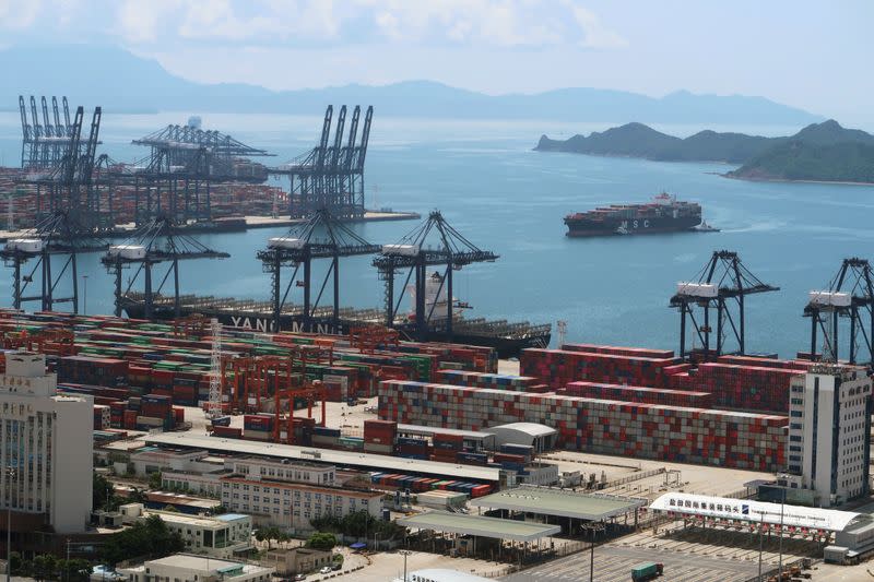 FILE PHOTO: Cargo ship carrying containers is seen near the Yantian port in Shenzhen, following the novel coronavirus disease (COVID-19) outbreak, Guangdong