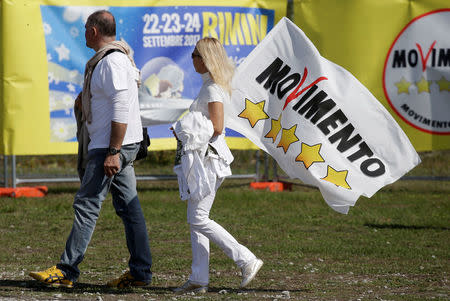 5-Star movement supporters walk during their gathering in Rimini, Italy, September 23, 2017. REUTERS/Max Rossi