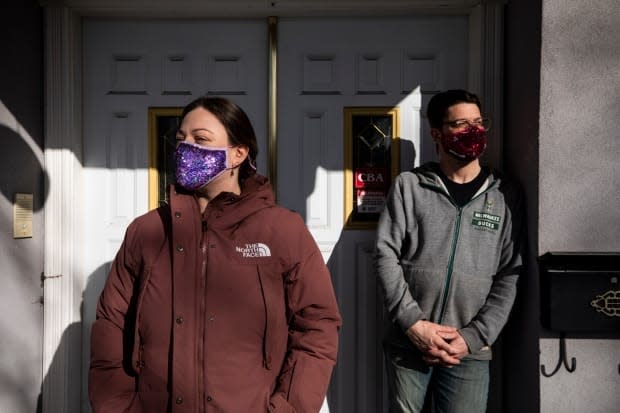 Steve and Melanie Whitlow say a missing number in paperwork submitted to Immigration, Refugees and Citizenship Canada resulted in their work permit extension being refused. (Ben Nelms/CBC - image credit)