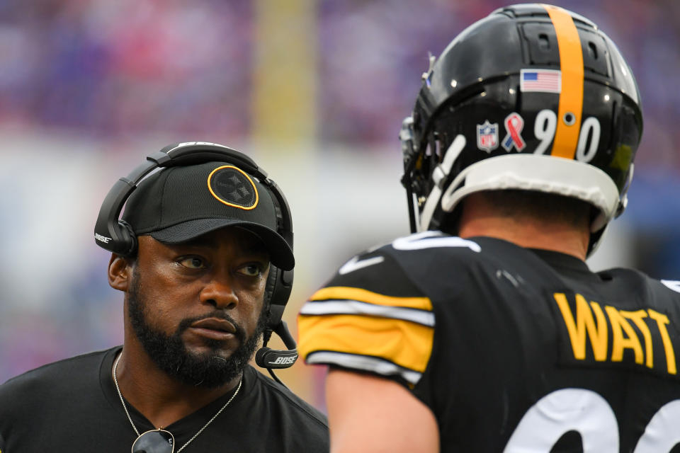 Sep 12, 2021; Orchard Park, New York, USA; Pittsburgh Steelers head coach Mike Tomlin talks with outside linebacker T.J. Watt (90) against the Buffalo Bills during the second half at Highmark Stadium. Mandatory Credit: Rich Barnes-USA TODAY Sports