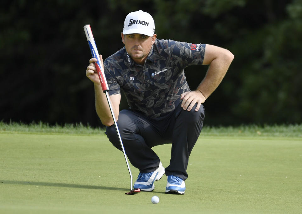 Keegan Bradley lines up a putt on the 14th green during the third round of the Travelers Championship golf tournament Saturday, June 22, 2019, in Cromwell, Conn. (AP Photo/Jessica Hill)