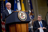 FILE - In this May 9, 2019 file photo, former Attorney General Jeff Sessions, accompanied by Attorney General William Barr, right, speaks during a farewell ceremony for Deputy Attorney General Rod Rosenstein in the Great Hall at the Department of Justice in Washington. Senate Democratic leaders are demanding that former Attorneys General Bill Barr and Jeff Sessions testify about the secret seizure of data from House Democrats in 2018. (AP Photo/Andrew Harnik)