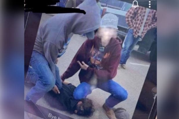 A trio of Mead High School students in Colorado posted the above image to Snapchat of them reenacting George Floyd’s murder.