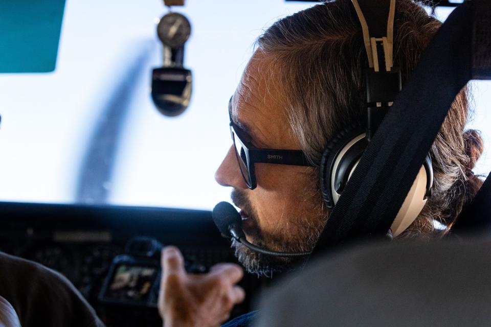 Neal Clark, wildlands director for the Southern Utah Wildlife Alliance, points out areas that will be impacted by the Labyrinth Canyon and Gemini Bridges Travel Plan on an EcoFlight above Moab on Friday, Sept. 22, 2023. The travel management plan from the Bureau of Land Management, which covers 300,00 acres near Moab, will be released by Sept. 30. | Megan Nielsen, Deseret News