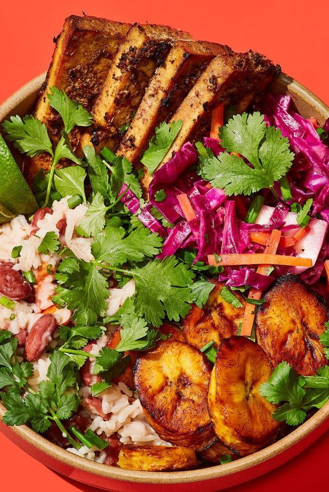 <p>This vegan recipe is a bit of a culinary road trip through Jamaica featuring <a href="https://www.delish.com/cooking/recipe-ideas/a34776930/sweet-plantains-recipe/" rel="nofollow noopener" target="_blank" data-ylk="slk:sweet plantains;elm:context_link;itc:0;sec:content-canvas" class="link ">sweet plantains</a>, aromatic rice and peas, and tofu in a jerk marinade.<br><br>Get the <strong><a href="https://www.delish.com/cooking/a36146989/vegan-tofu-grain-bowl/" rel="nofollow noopener" target="_blank" data-ylk="slk:Jerk Tofu Grain Bowls recipe;elm:context_link;itc:0;sec:content-canvas" class="link ">Jerk Tofu Grain Bowls recipe</a></strong>.</p>