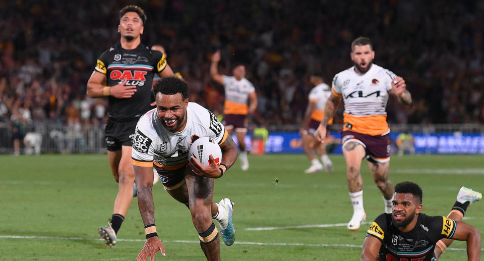 Seen here, Ezra Mam crosses for one of his three tries for Brisbane in the 2023 NRL grand final against Penrith. 