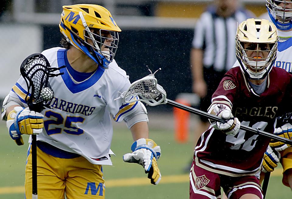 Mariemont's David Dorsten (25) had five goals in the Warriors' 9-5 victory over Bellbrook in the Division II regional semifinals on May 22, 2023.