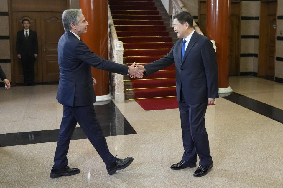 U.S. Secretary of State Antony Blinken meets with China's Minister of Public Security Wang Xiaohong, right, at the Diaoyutai State Guesthouse, Friday, April 26, 2024, in Beijing, China. (AP Photo/Mark Schiefelbein, Pool)