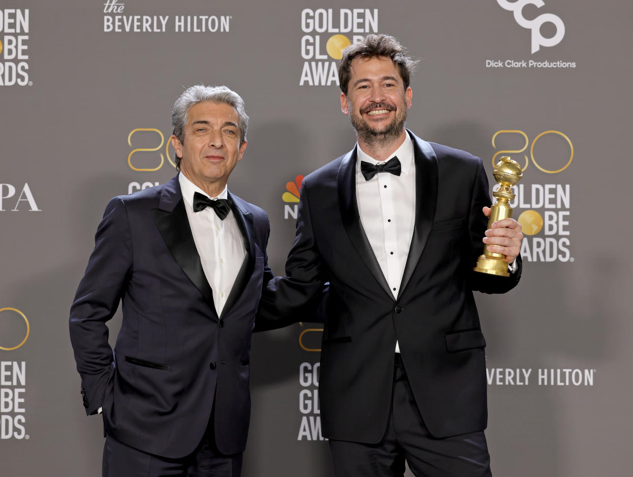 BEVERLY HILLS, CALIFORNIA - JANUARY 10: (L-R) Santiago Mitre and Ricardo Darin pose with the award for Best Picture - Non-English Language (formerly Foreign Language) for 