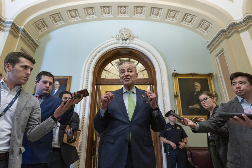 Senate Majority Leader Chuck Schumer of N.Y., speaks with reporters at the Capitol in Washington, Thursday, June 24, 2021. A bipartisan group of lawmakers have negotiated a plan to pay for an estimated $1 trillion compromise plan. (AP Photo/Alex Brandon)