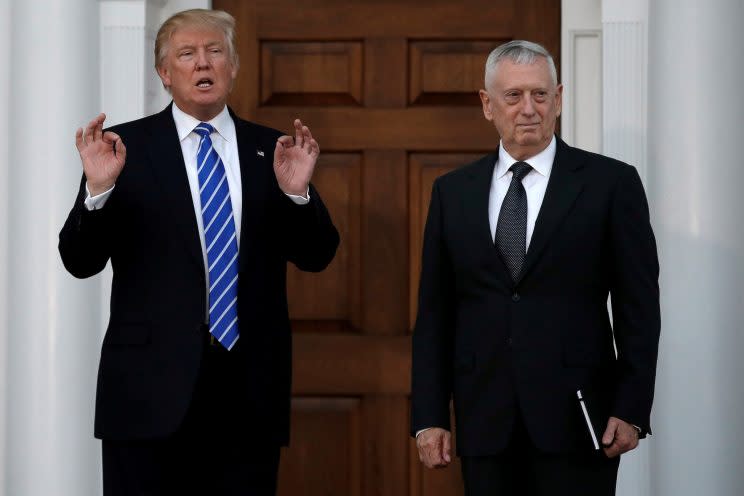 Donald Trump stands with retired Marine Gen. James Mattis following their meeting at the main clubhouse at Trump National Golf Club in Bedminster, N.J. (Photo: Mike Segar/Reuters)