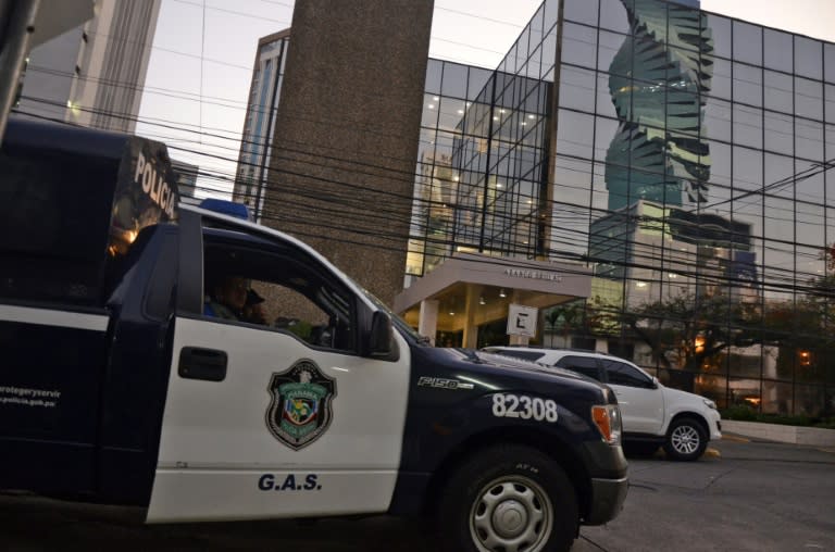 A police car is seen outside the Mossack-Fonseca law firm offices in Panama City during a raid on April 12, 2016