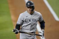 New York Yankees' Aaron Judge turns to the dugout after striking out in the first inning of a baseball game against the Texas Rangers in Arlington, Texas, Monday, May 17, 2021. (AP Photo/Tony Gutierrez)