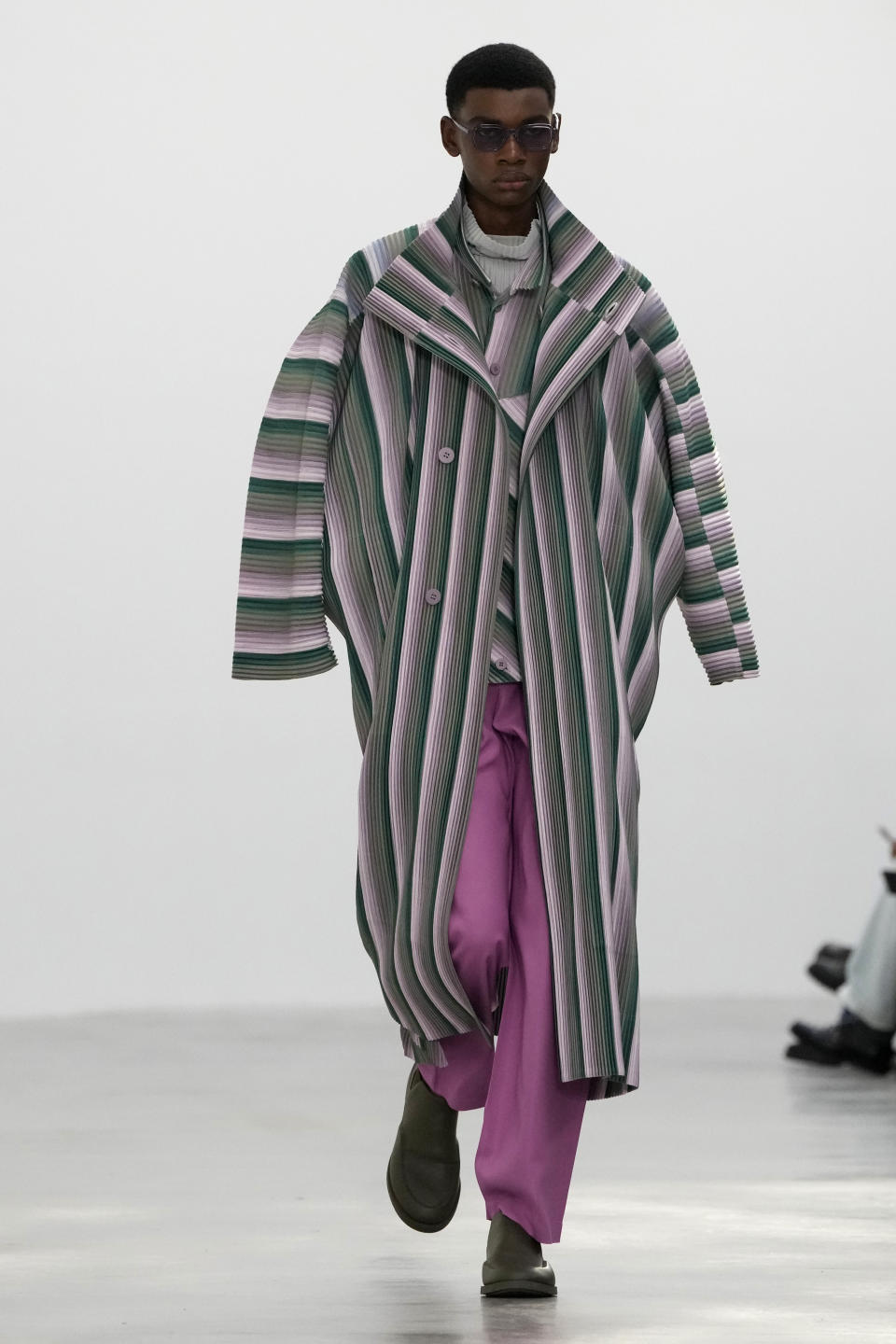 A model wears a creation for Issey Miyake as part of the Menswear ready-to-wear Fall-Winter 2024-2025 collection presented in Paris, Thursday, Jan. 18, 2024. (AP Photo/Thibault Camus)