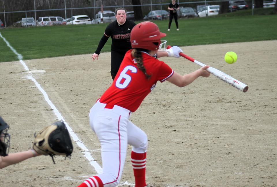 Spaulding's Izzy Brennan executes a bunt during Friday's Division I game against Portsmouth in Rochester