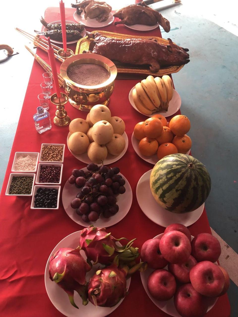 It’s a common practice in China for brands and agencies to offer fruits, roasted pig, and chicken, as well as liquor and five kinds of grains to deities at a praying ceremony prior to the event. - Credit: Courtesy