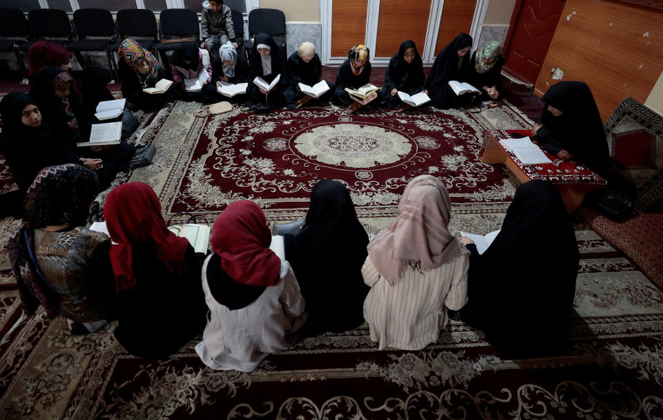 Afghan women learn how to read the Koran at Zainabia madrassa in Kabul, Afghanistan, November 6, 2021. REUTERS/Zohra Bensemra