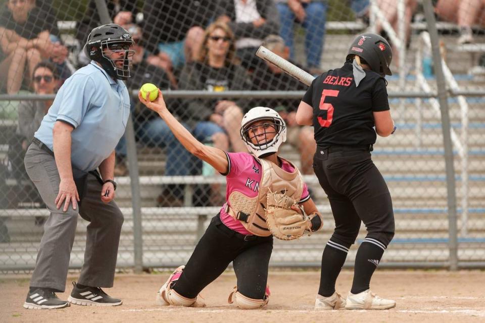 Bishop Kelly senior Ava Armuth, center, was voted the 4A SIC Player of the Year by the league's coaches. 