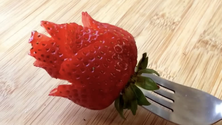 strawberry rose on fork