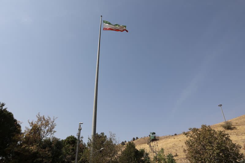 Iranian flag is seen flying over Evin prison in Tehran