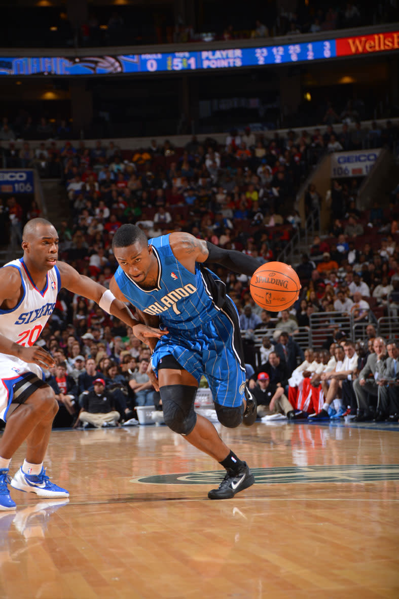 PHILADELPHIA, PA - APRIL 7: Von Wafer #1 of the Orlando Magic drives to the basket against Jodie Meeks #20 of the Philadelphia 76ers on April 7, 2012 at the Wells Fargo Center in Philadelphia, Pennsylvania. NOTE TO USER: User expressly acknowledges and agrees that, by downloading and/or using this Photograph, user is consenting to the terms and conditions of the Getty Images License Agreement. Mandatory Copyright Notice: Copyright 2012 NBAE