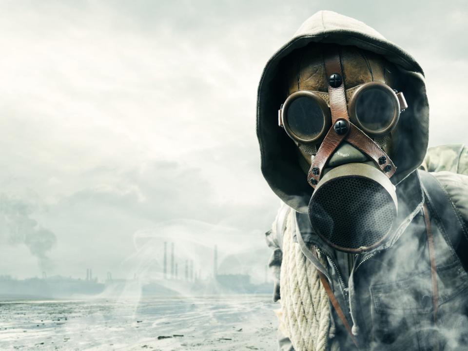 A person wearing a gas mask.