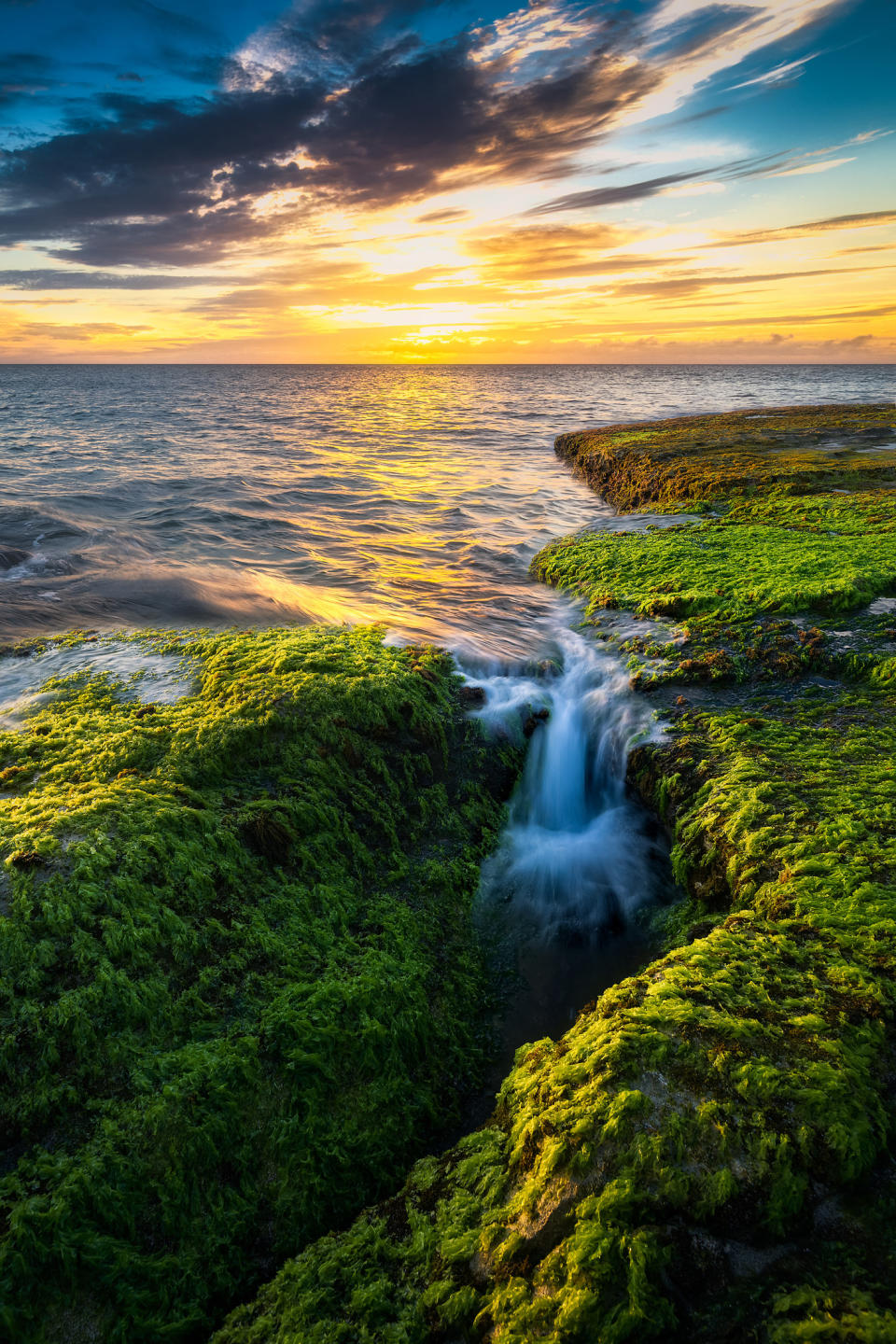 Sunset over Mokule'ia Beach on Oahu's North Shore.