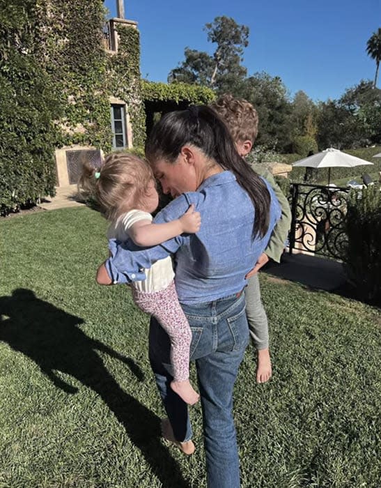 meghan-holding-kids