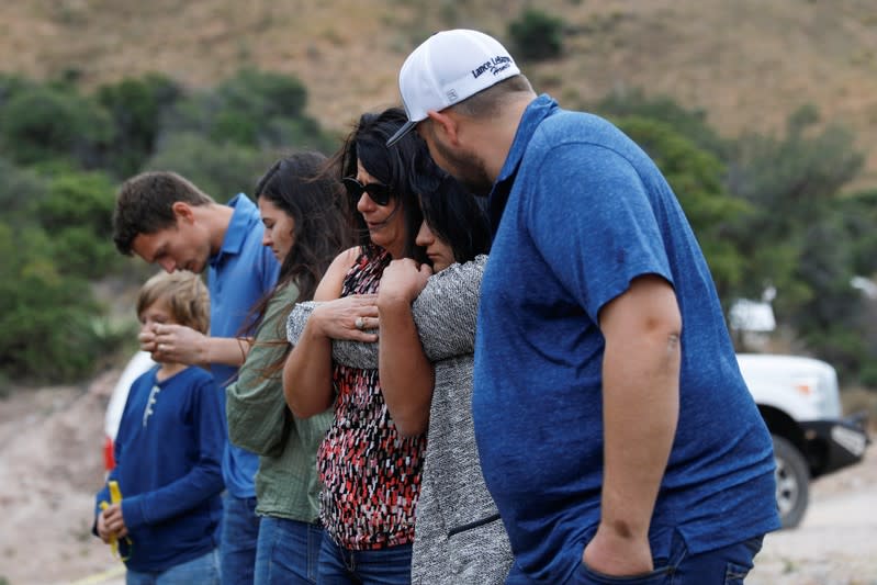 Relatives of the Rhonita Miller-Lebaron and Dawna Ray Langford and their children who were killed by unknown assailants, react after they make a stop at the crime scene during their journey to bury the Miller-Lebaron Family near Bavispe