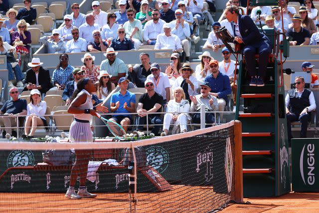 <p>EMMANUEL DUNAND/AFP via Getty</p> Coco Gauff speaking to the umpire on June 6