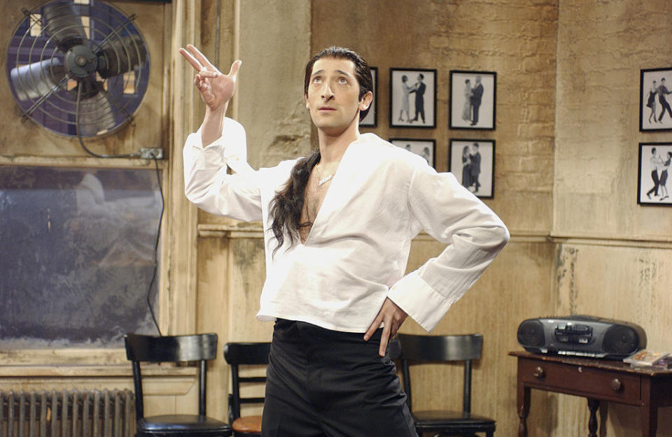 Adrian Brody wearing a light-colored shirt and long ponytail in a sketch