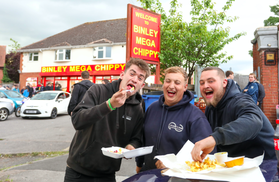 Customers (L-R) Jake, Tom and Josh travelled from Portsmouth for their chips. (SWNS)