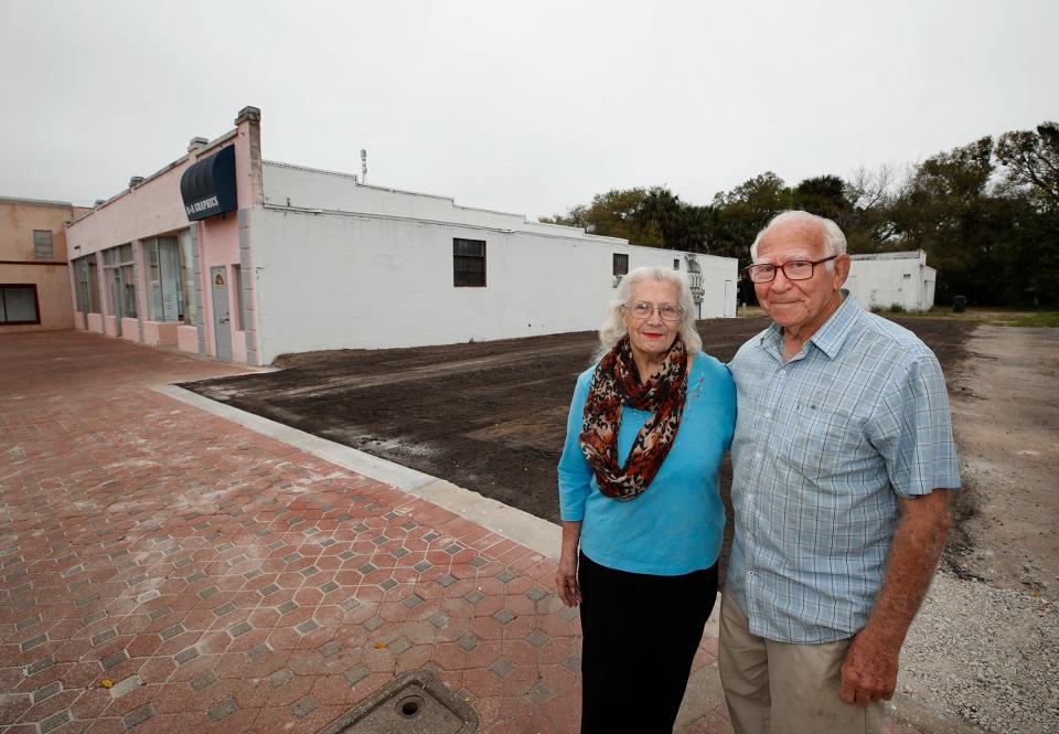 Ruth and Warren Trager are pictured standing in front of the old Second Avenue Pawn Shop building site on Mary McLeod Bethune Boulevard in March 2021. The building they owned on that site was deteriorating and had to be torn down.