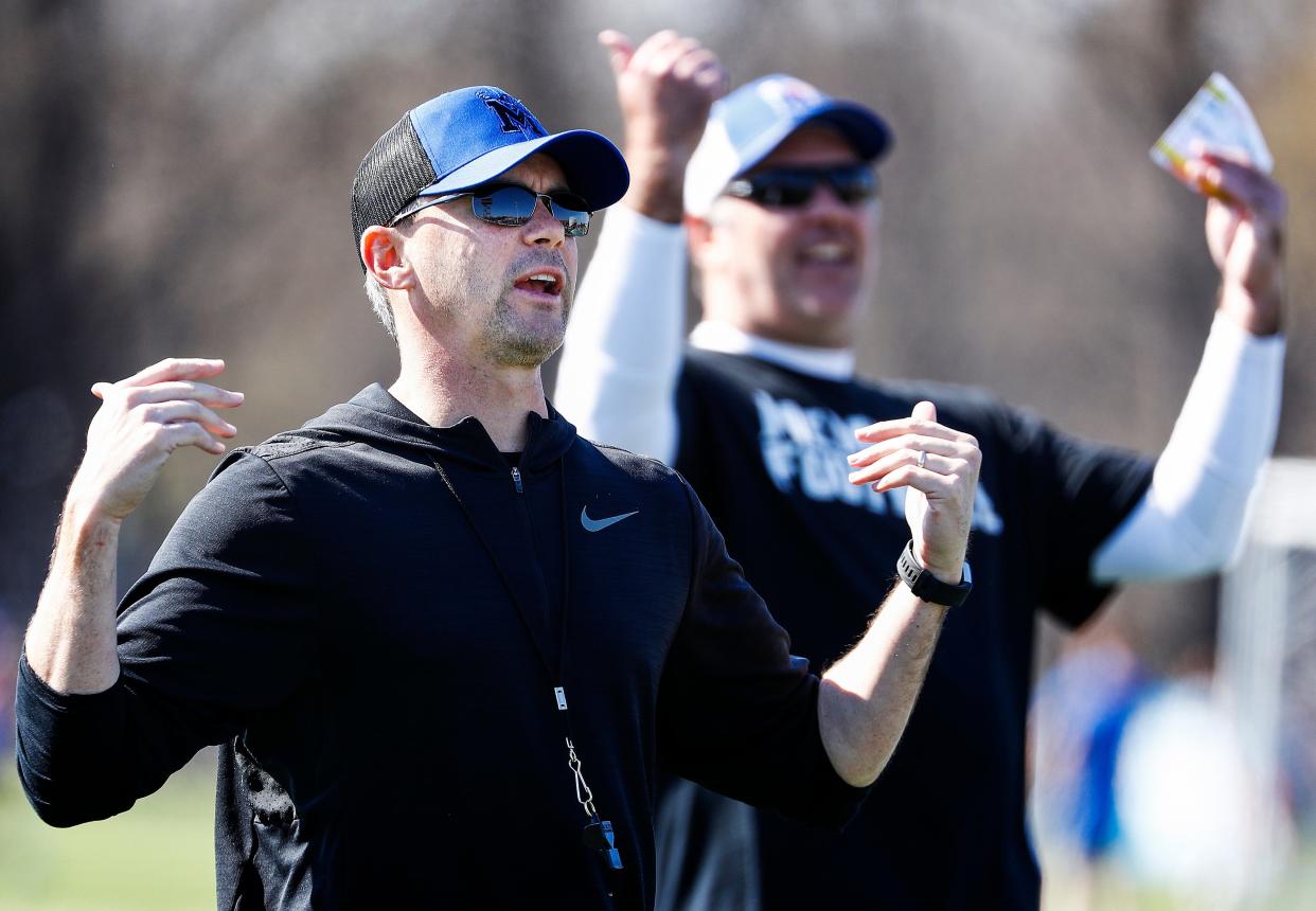 Memphis head coach Mike Norvell (left) during spring football practice. 