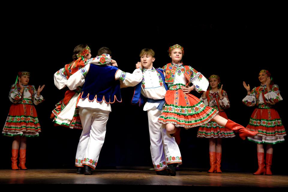 From left: Anna Vitushynska, Dennis Yusupov, Max Golkov and Anna Pashkevych spin during a performance with their dance group Kalina from the Nadiya Dance School during a fundraiser for Ukraine at the Lakewood Estonian House on Saturday, May 14, 2022 in Jackson, New Jersey. 