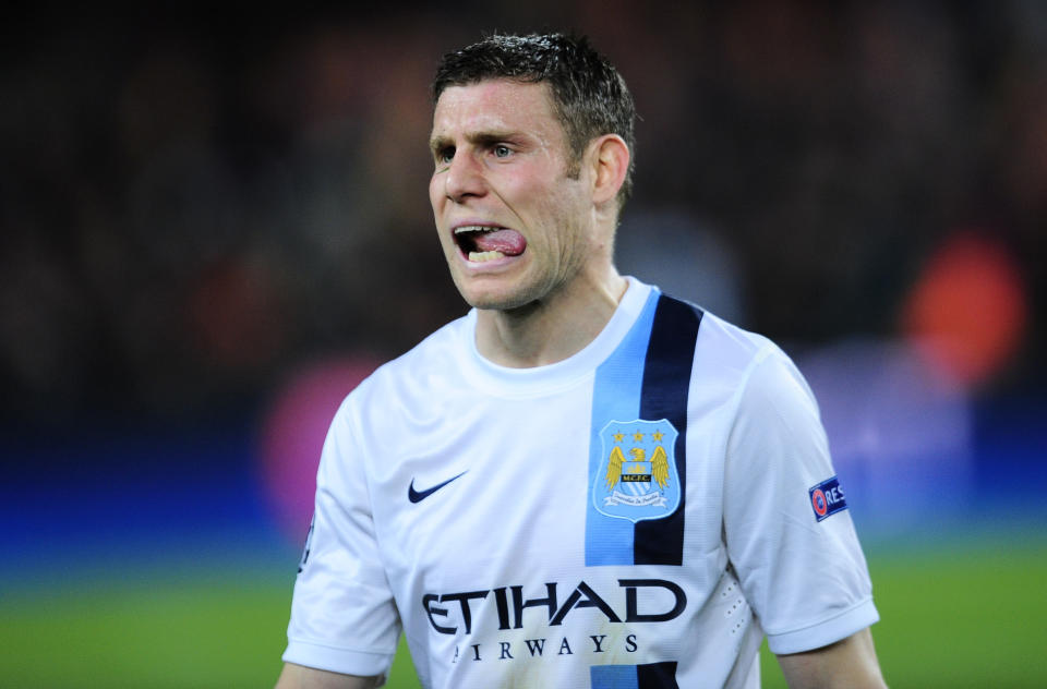 Manchester City's James Milner leaves the pitch at the end of their Champions League, round of 16, second leg, soccer match between FC Barcelona and Manchester City at the Camp Nou Stadium in Barcelona, Spain, Wednesday March 12, 2014. Barcelona won the game 2-1. (AP Photo/Manu Fernandez)