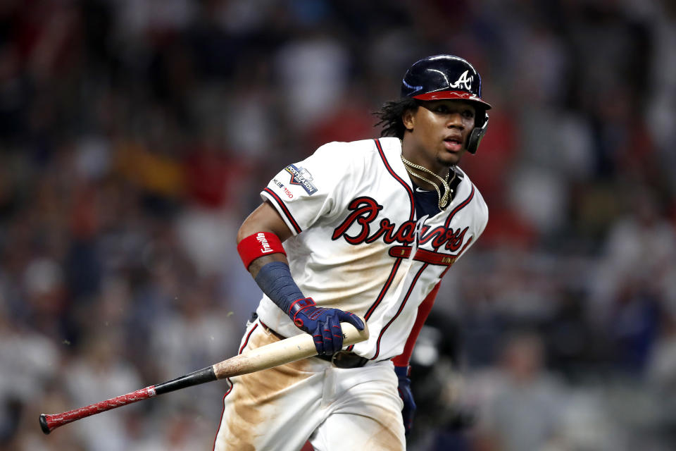 ATLANTA, GEORGIA - OCTOBER 03:  Ronald Acuna Jr. #13 of the Atlanta Braves watches his hit for a single against the St. Louis Cardinals during the seventh inning in game one of the National League Division Series at SunTrust Park on October 03, 2019 in Atlanta, Georgia. (Photo by Todd Kirkland/Getty Images)