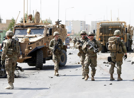 U.S. and NATO troops arrive at the site of a car bomb attack in Kabul, Afghanistan. September 24, 2017.REUTERS/Omar Sobhani