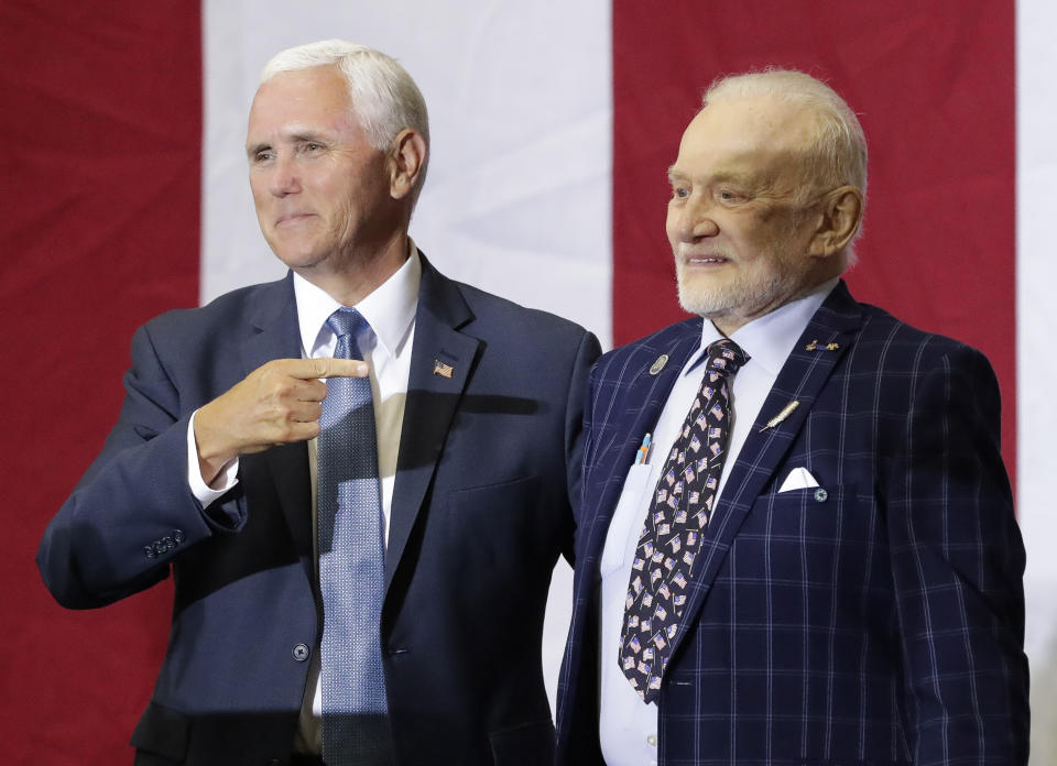 Vice President Mike Pence, left, points to Apollo 11 astronaut Buzz Aldrin during an event at the Kennedy Space Center in recognition of the Apollo 11 anniversary, Saturday, July 20, 2019, in Cape Canaveral, Fla. (AP Photo/John Raoux)