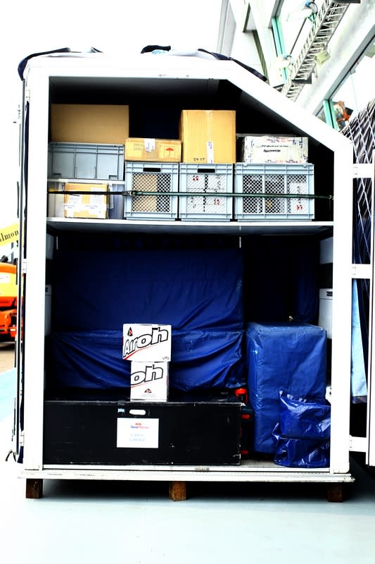 It takes 2.5 days and about 12 people to complete the logistics of setting up the garage. (Courtesy of Scuderia Toro Rosso)