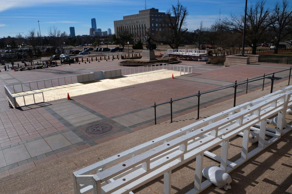 A view from the state Capitol steps shows the stage and media platforms for the Oklahoma governor's inauguration ceremony as the space takes shape for Monday's inauguration on the south plaza.